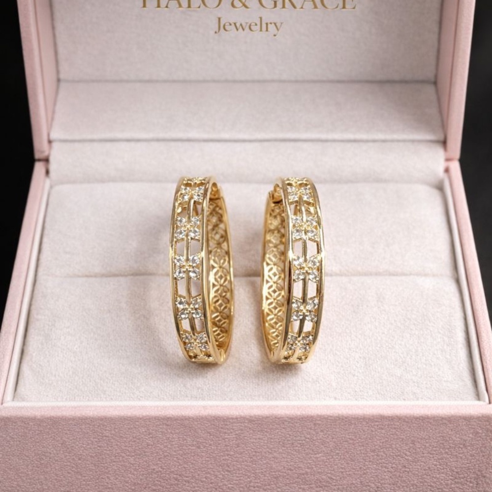 14k old earrings hoops with starburst design